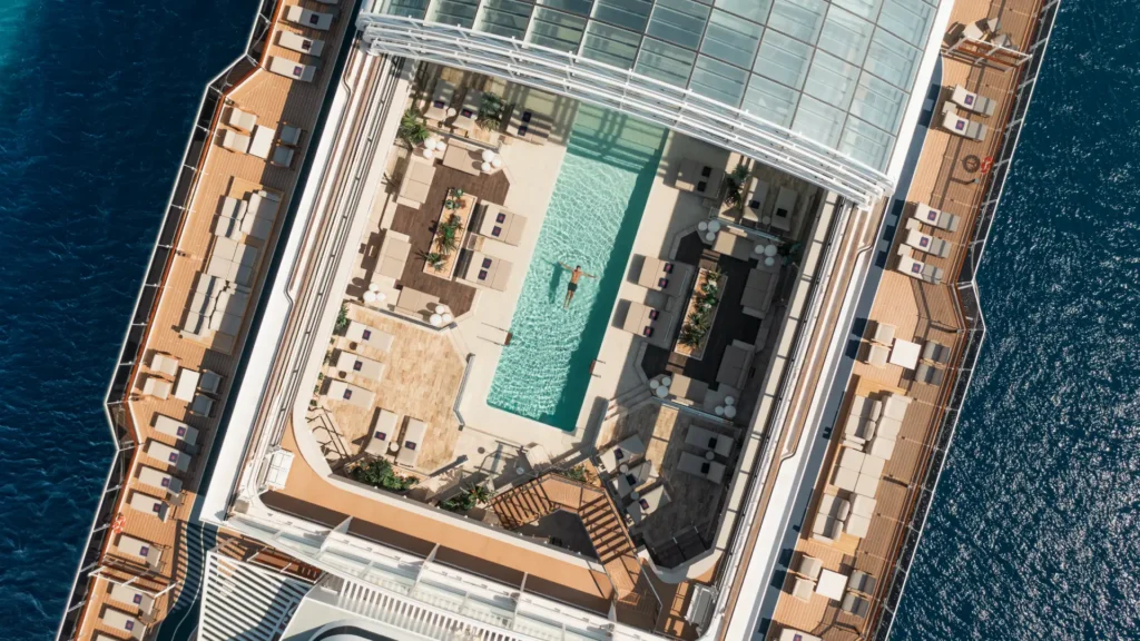 Hilton Honors and Explora Journeys cruise ship pool © 2025 Hilton